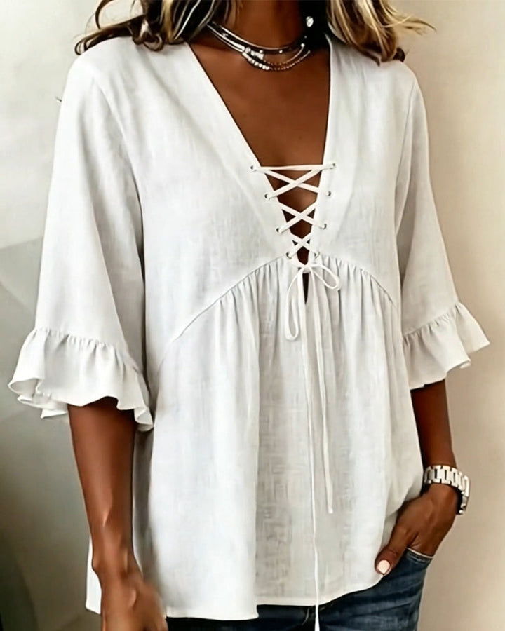 Blusa Unie con escote en V y volantes