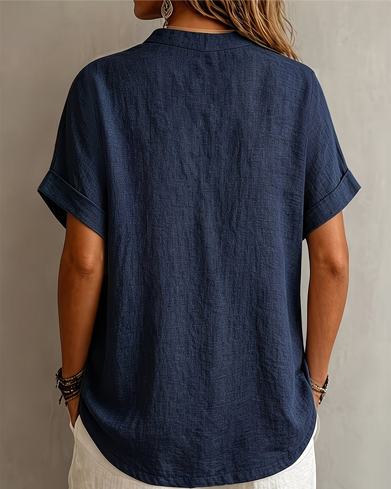 Blusa de escote en V de manga corta holgada