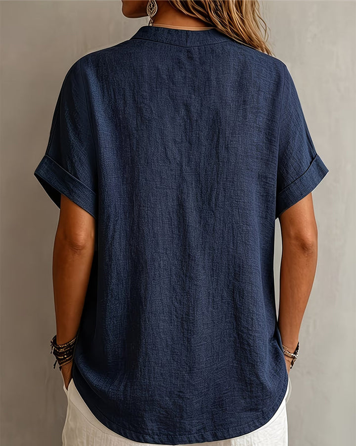 Blusa de escote en V de manga corta holgada