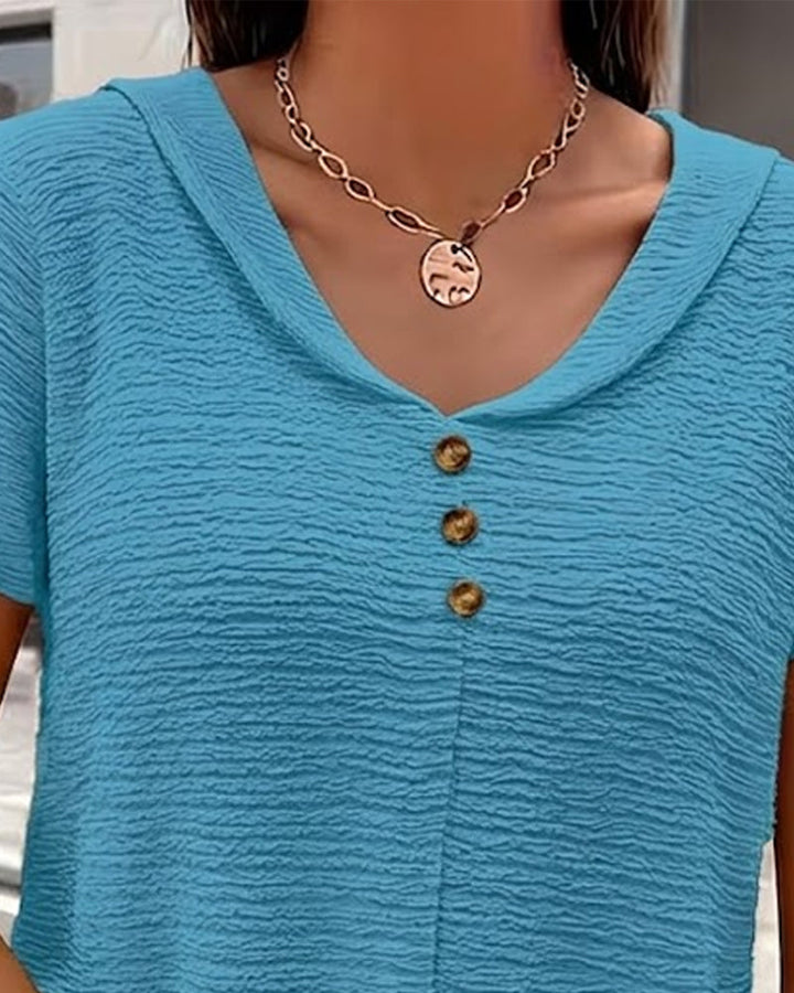 Camiseta con cuello Peter Pan y tres botones