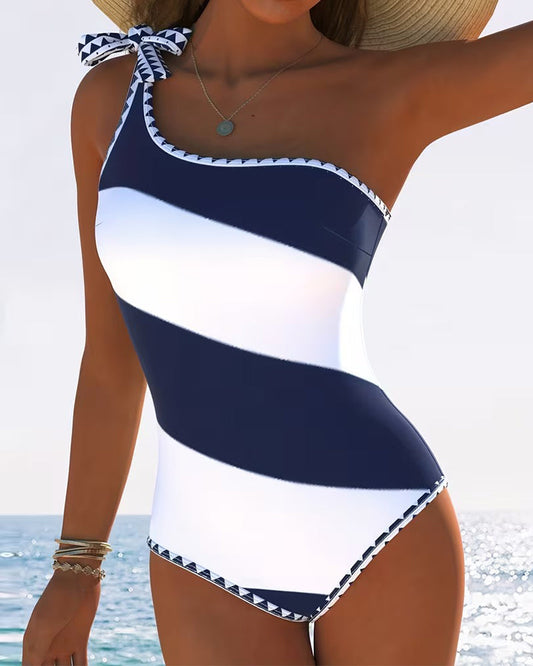 Traje de baño de una pieza con bloques de color rayados