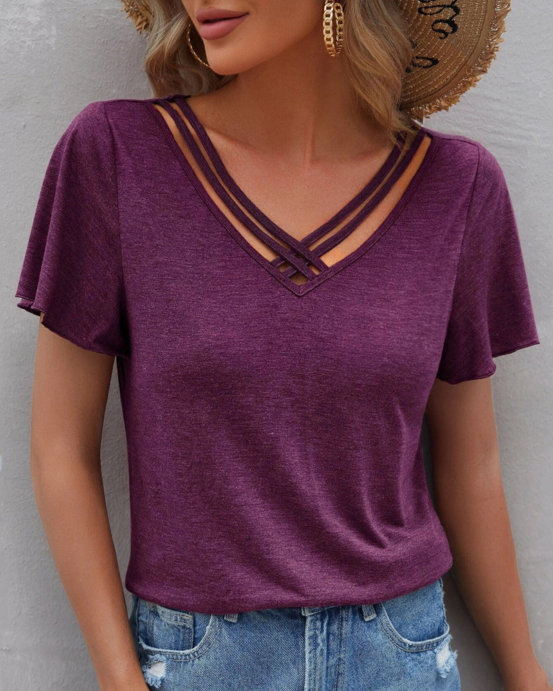 Camiseta con recortes de color sólido