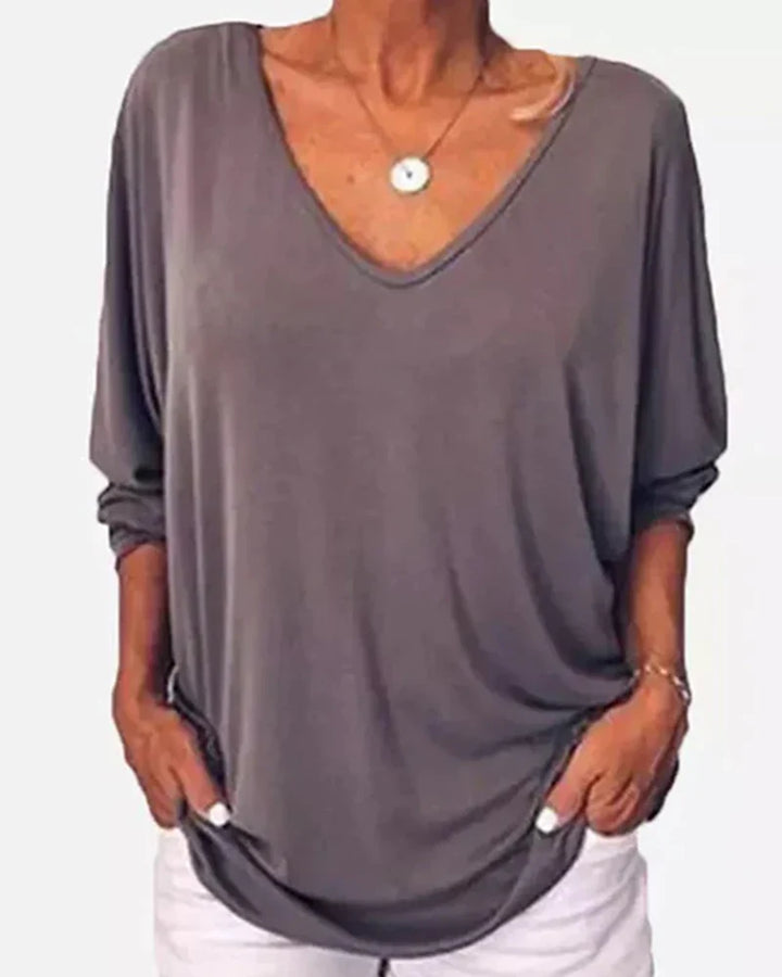 Top de cuello en V con botones en la espalda, mangas 3/4