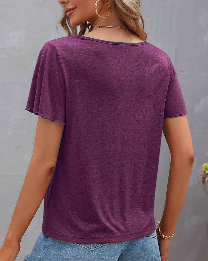 Camiseta con recortes de color sólido