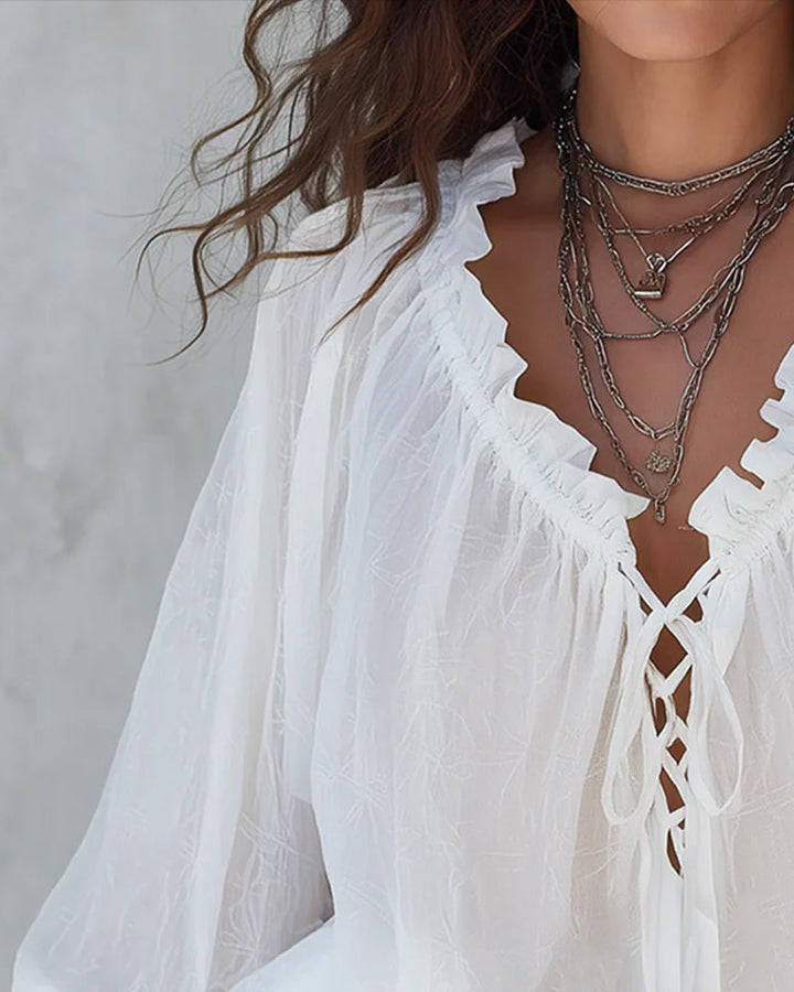 Blusa de cuello en V con lazos