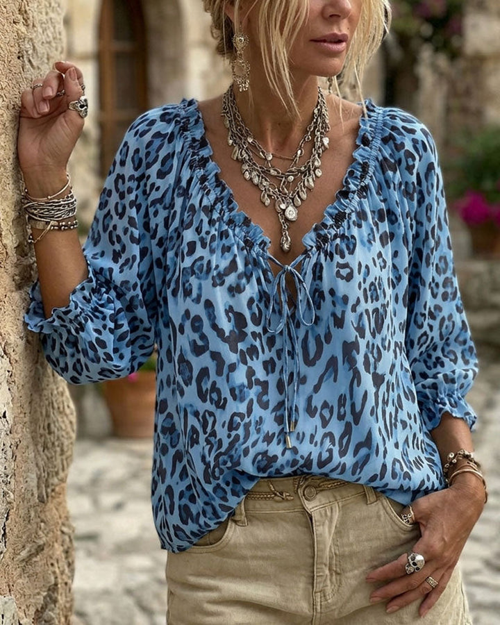 Blusa estampada de leopardo cuello en V mangas abullonadas con lazos