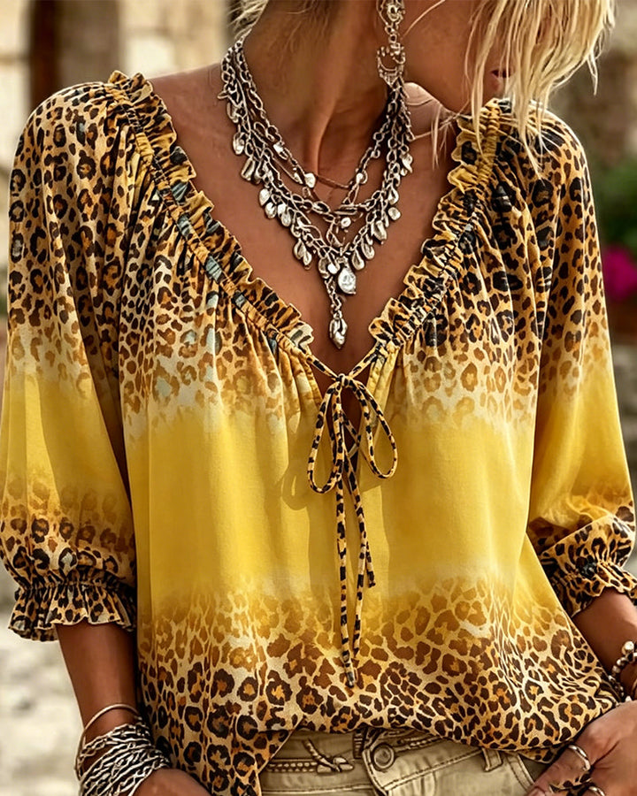 Blusa de escote en V con estampado de leopardo y encaje