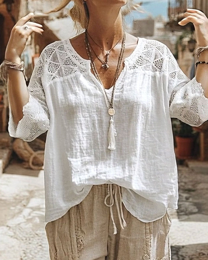 Blusa lisa panelada con escote en V