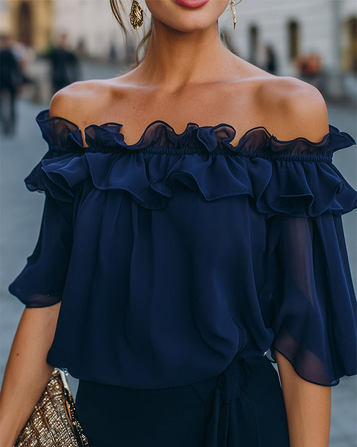 Blusa elegante sin hombros con volantes