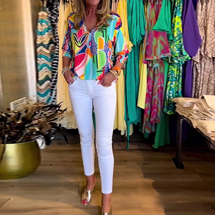 Blusa amplia estampada de manga larga