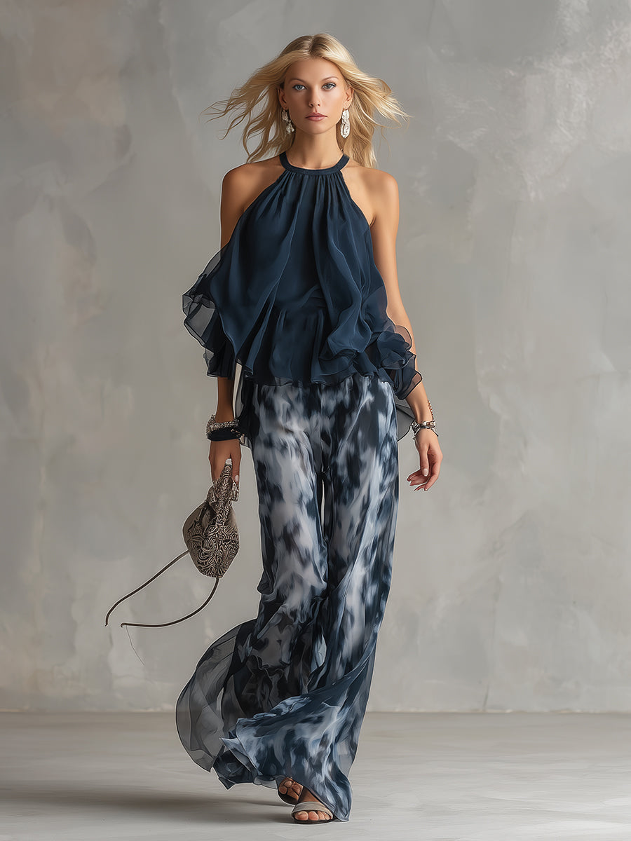 Ludovica - elegante en chiffón con top de cuello alto y pantalones anchos estampados
