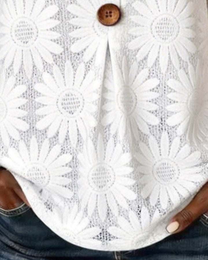 Blusa con estampado de margaritas y mangas con volantes