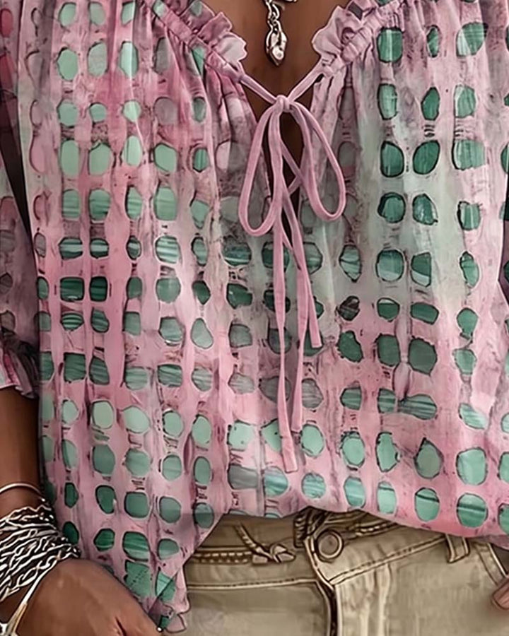 Blusa de lunares con lazos