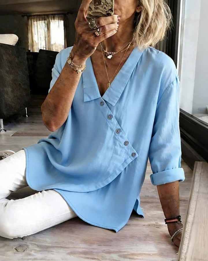 Blusa con cuello y botonadura diagonal asimétrica