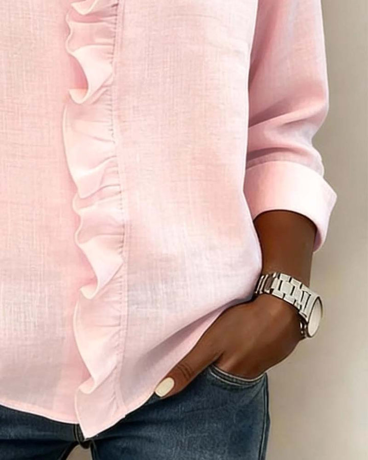 Blusa de manga larga con volantes y escote en V
