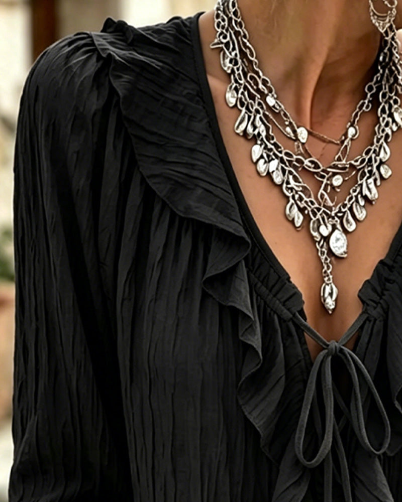 Blusa de manga larga con volante y ribete de encaje