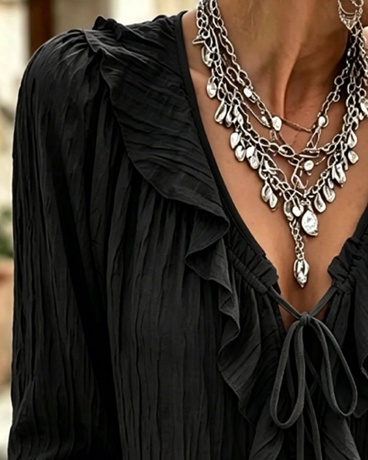 Blusa de manga larga con volante y ribete de encaje