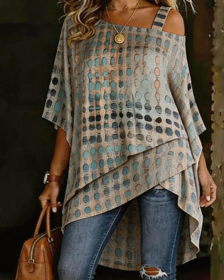 Blusa estampada de lunares con escote asimétrico de un solo hombro