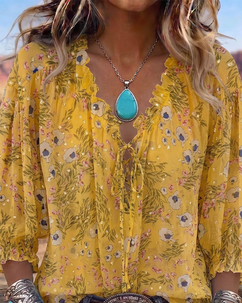 Blusa casual floral con lazo