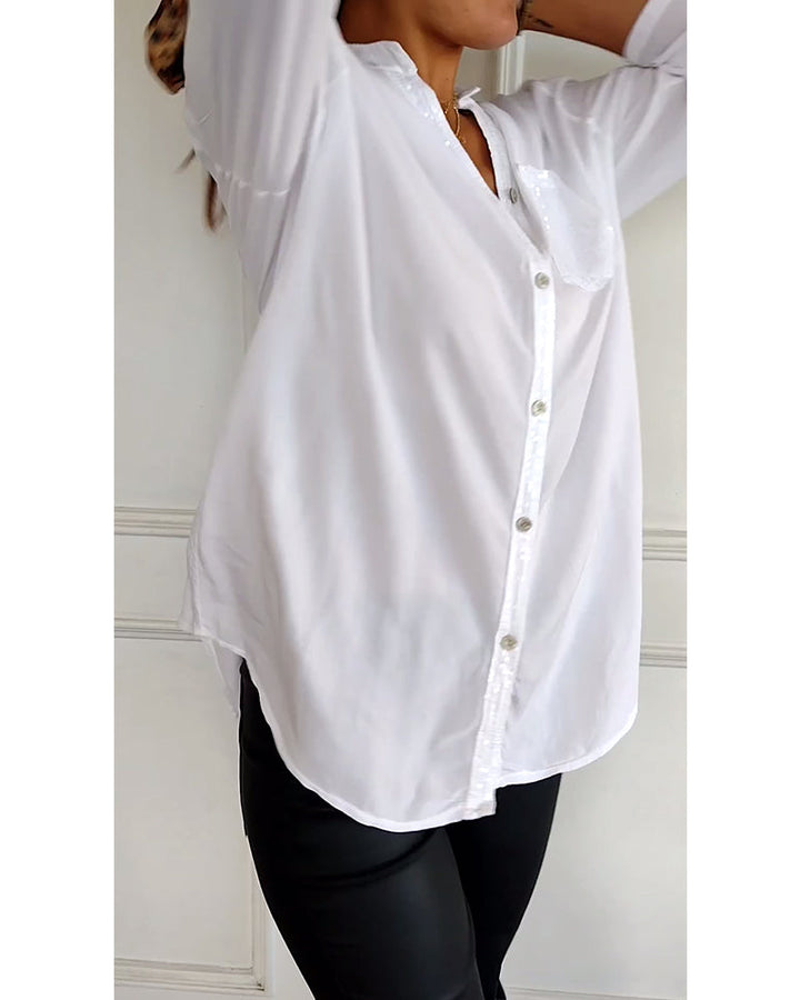 Top casual con paneles y botones con lentejuelas