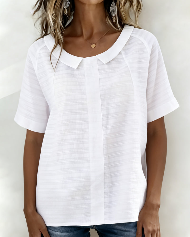 Blusa texturizada con cuello Peter Pan