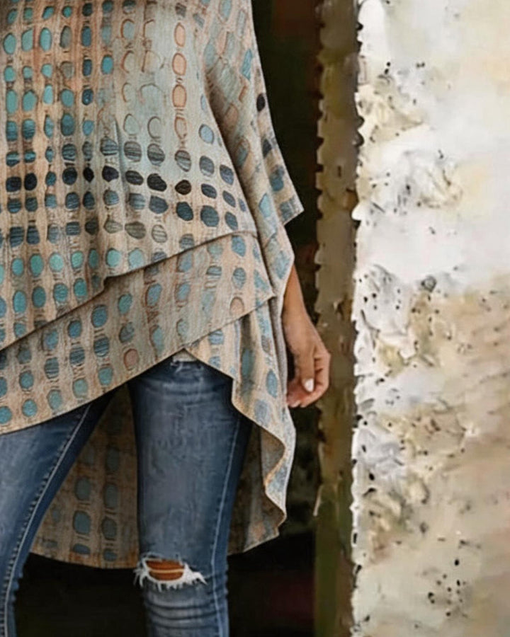 Blusa estampada de lunares con escote asimétrico de un solo hombro