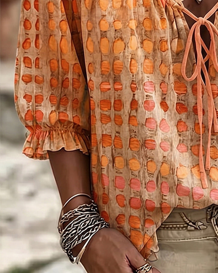 Blusa de lunares con lazos