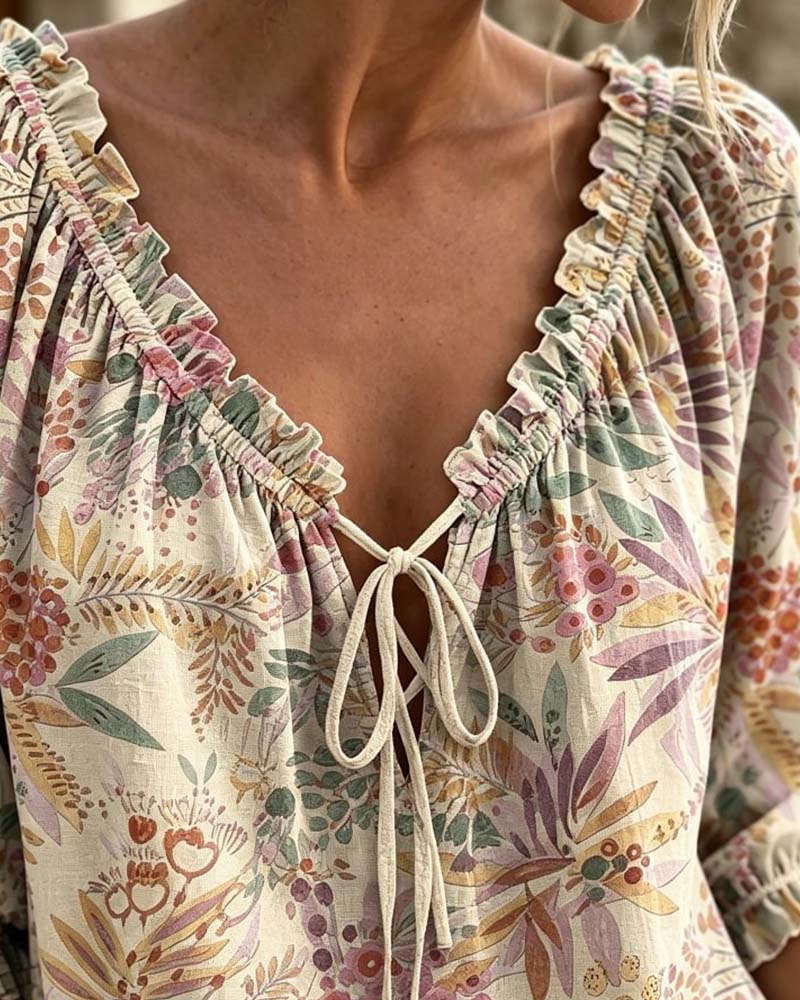 Blusa con escote en V y lazos