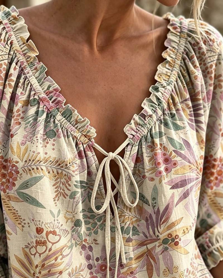 Blusa con escote en V y lazos
