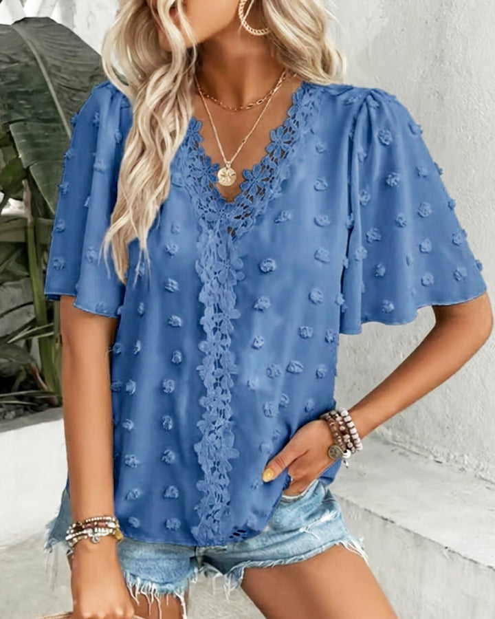 Blusa jacquard con manga volante