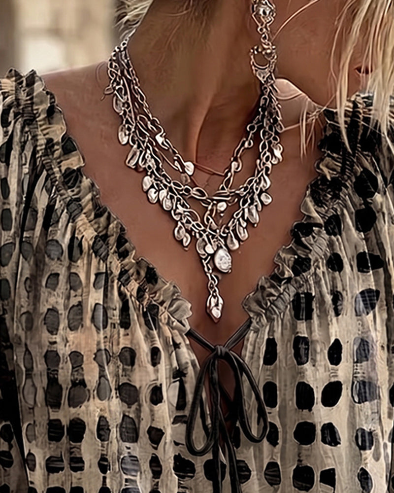 Blusa de lunares con lazos