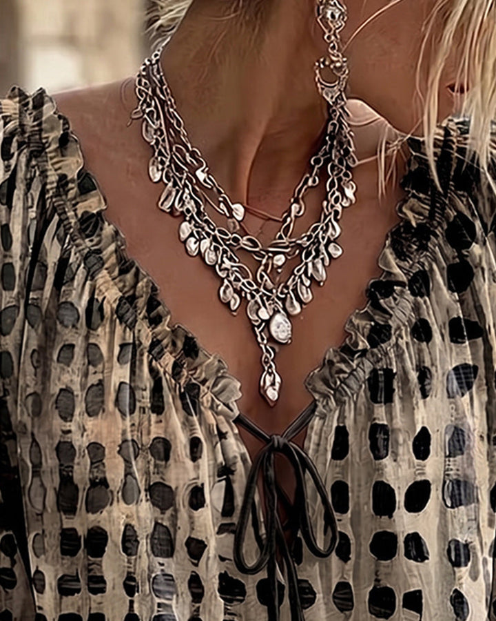 Blusa de lunares con lazos