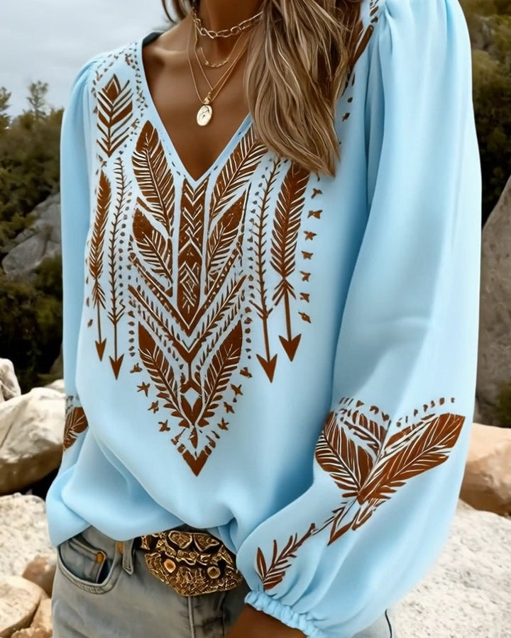Blusa de manga abullonada con escote en V y corte amplio