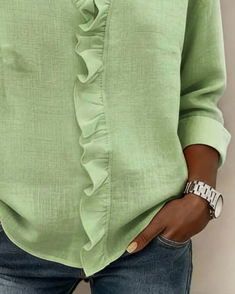 Blusa de manga larga con volantes y escote en V