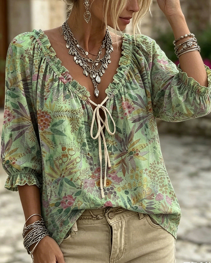 Blusa con escote en V y lazos
