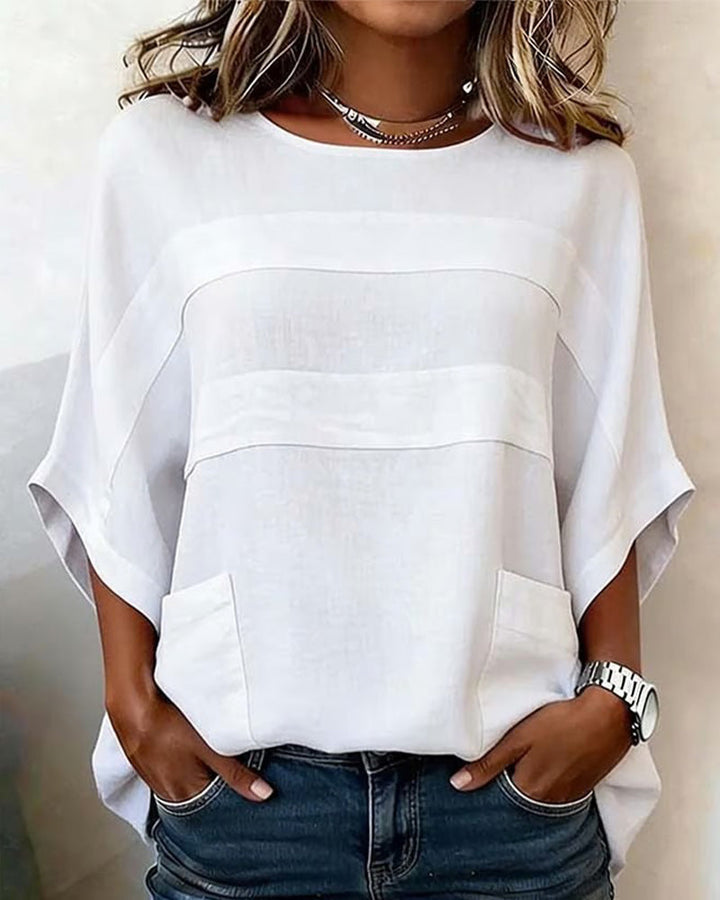 Blusa 100% algodón, mangas murciélago, corte holgado, cuello redondo