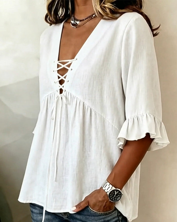 Blusa Unie con escote en V y volantes