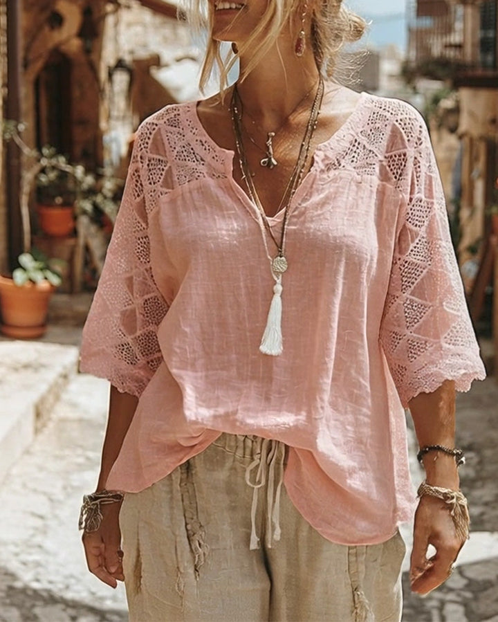Blusa lisa panelada con escote en V