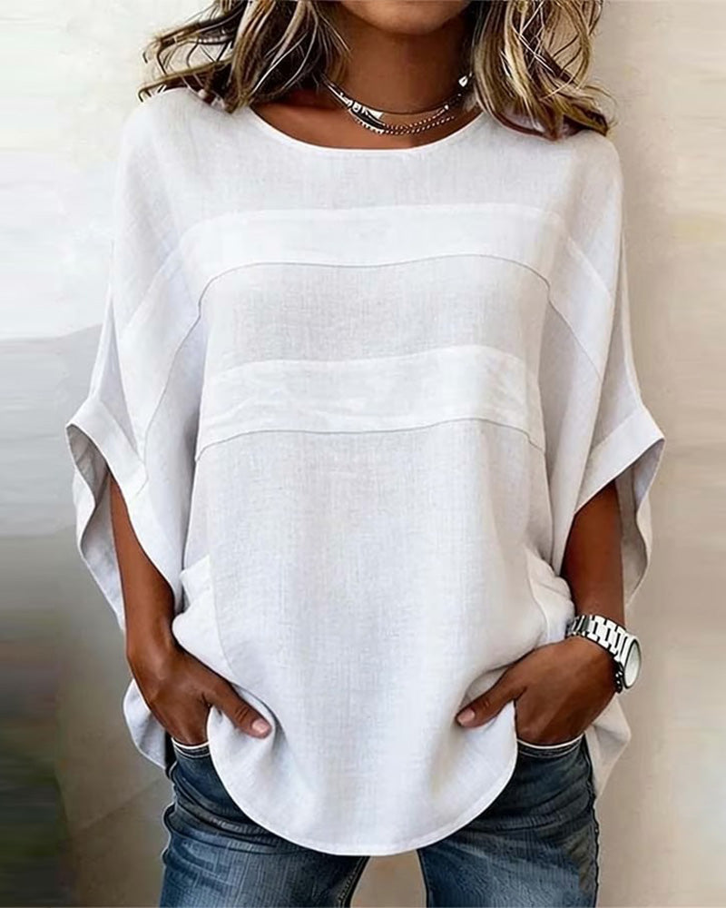 Blusa 100% algodón, mangas murciélago, corte holgado, cuello redondo