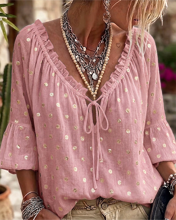 Blusa con escote en V y mangas acampanadas