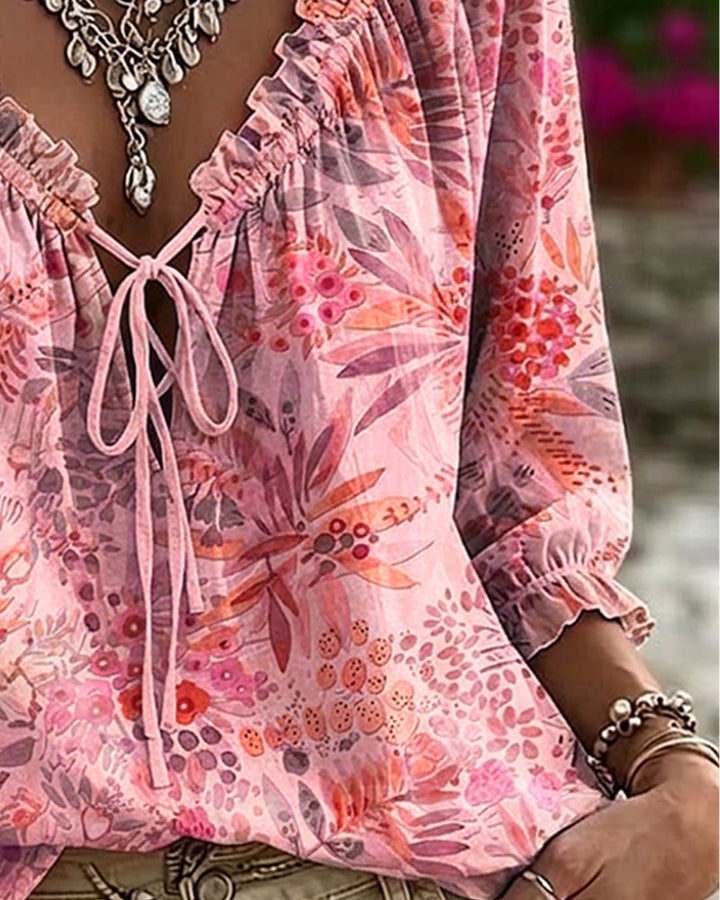 Blusa con escote en V y lazos