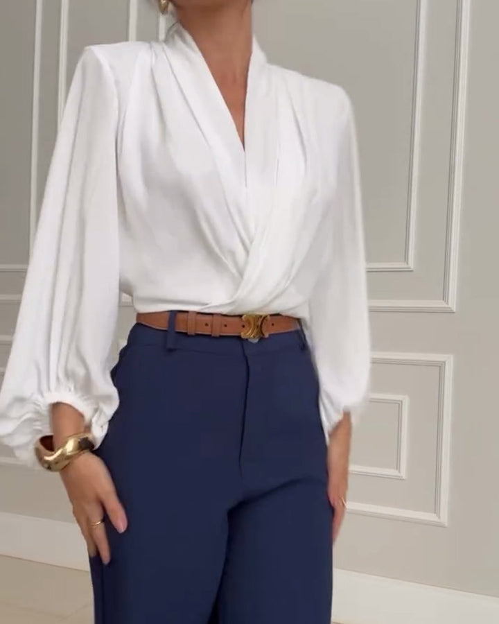 Blusa de moda con mangas farol y escote en V de color sólido