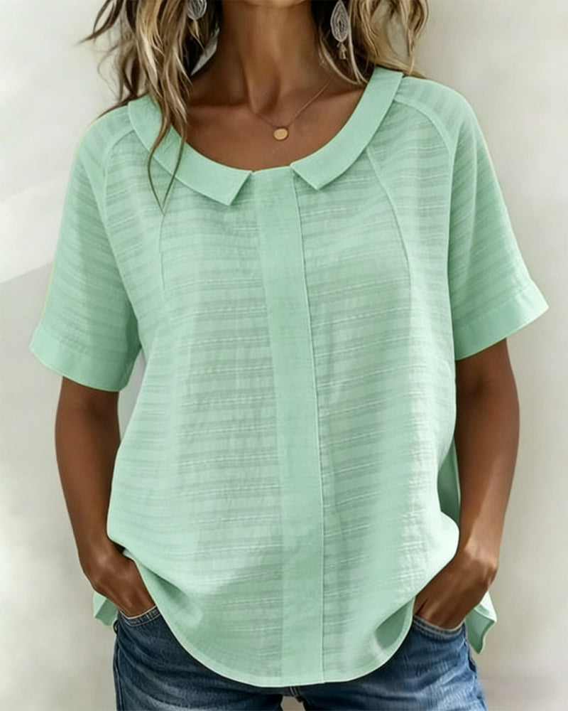Blusa texturizada con cuello Peter Pan