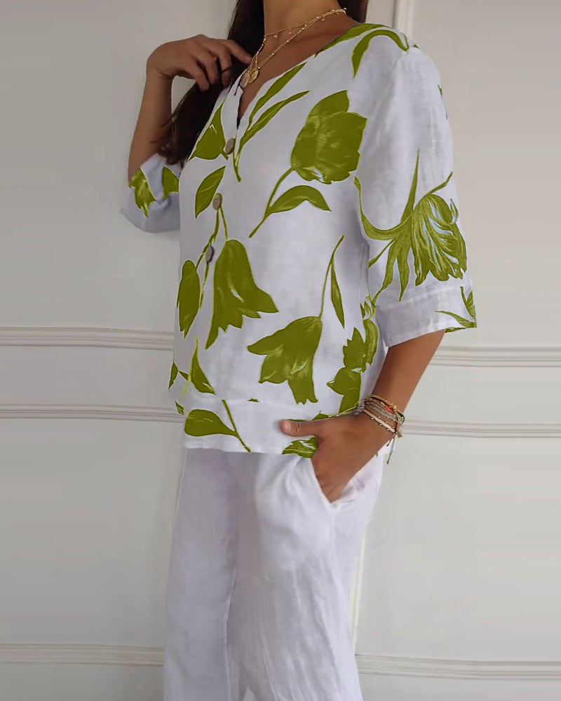 Top abotonado de algodón y lino con estampado floral