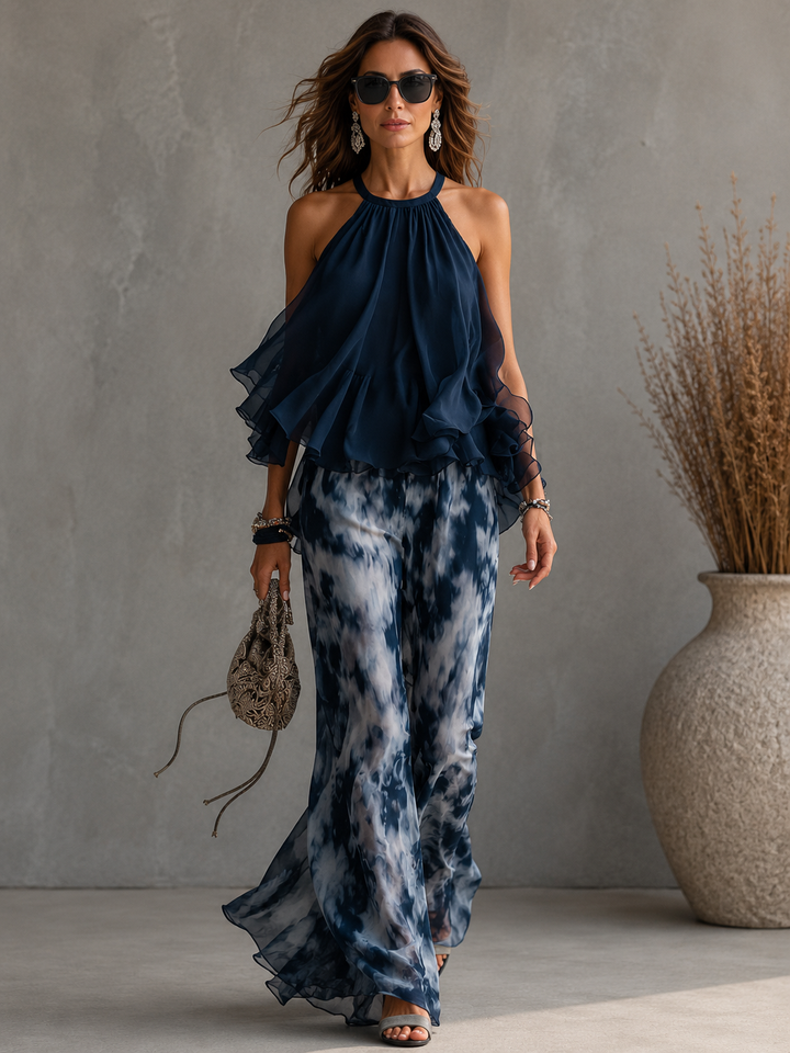Ludovica - elegante en chiffón con top de cuello alto y pantalones anchos estampados